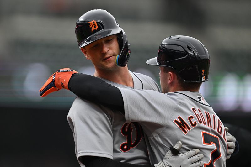 Tigers catcher Dillon Dingler (13) is hugged at home plate by infielder Kevin McGonigle (7) after hitting a two-run home run in the first inning against the Baltimore Orioles during the second game of a doubleheader Sunday, May 24, 2026, at Oriole Park at Camden Yards in Baltimore.