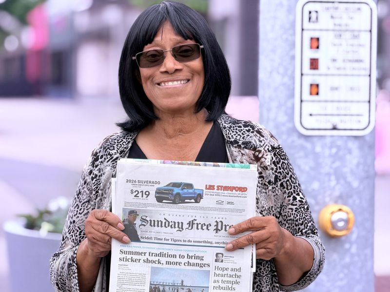 The smile on Angelette Green's face on May 24 concealed the pain she felt following the death of her dear friend David Woods, who sold Sunday newspapers from the same corner on Seven Mile and Livernois, where Green stood.