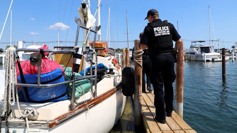 CBP officers conduct inspections at a marina near Detroit