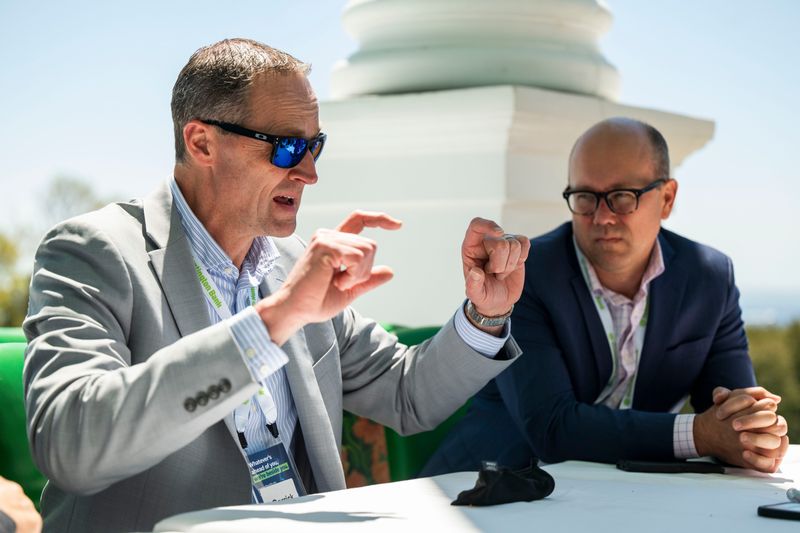 Consumers Energy CEO Garrick Rochow (left) and senior vice president Brandon Hofmeister (right) acknowledged that efforts to construct massive data centers for big tech companies has been hampered by misinformation on social media. They spoke to The Detroit News during a May 26 interview at the Detroit Regional Chamber's annual Mackinac Policy Conference at the Grand Hotel on Mackinac Island.