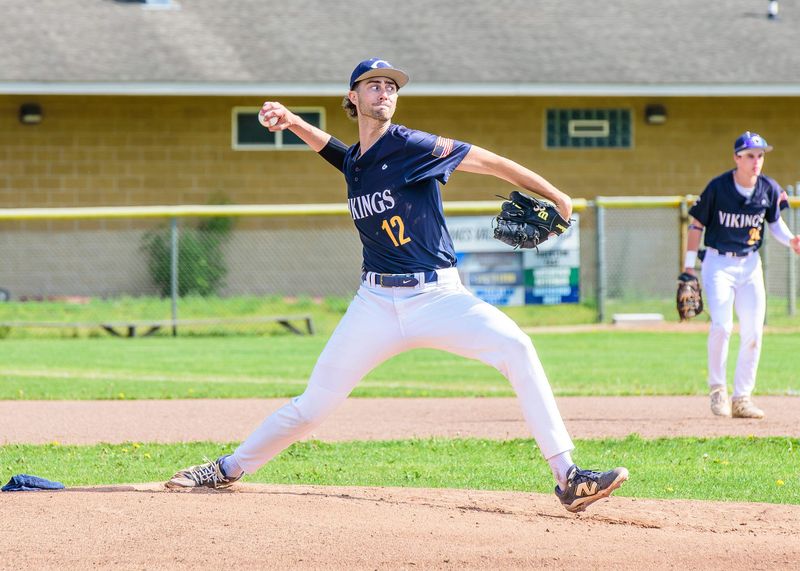 Walled Lake Central's Dylan Chesnut pitches during the Division 1 baseball pre-district on Tuesday, May 26, 2026, at Milford High School.