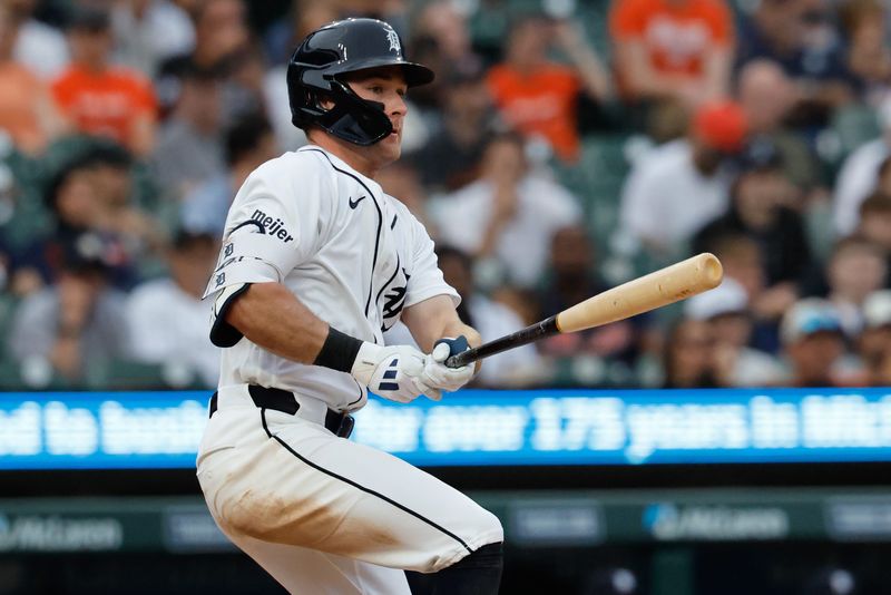 Detroit Tigers shortstop Kevin McGonigle (7) hits an RBI triple in the fifth inning against the Los Angeles Angels at Comerica Park in Detroit on Tuesday, May 26, 2026.