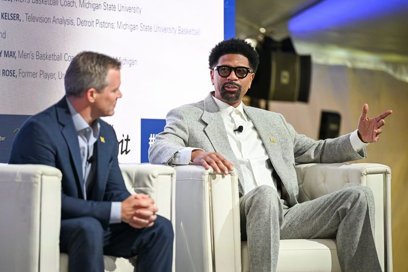 Michigan basketball coach Dusty May, left, and basketball legend Jalen Rose, right, speak during a panel about the 2027 NCAA Final Four in Detroit on Wednesday during the Mackinac Policy Conference on Mackinac Island.