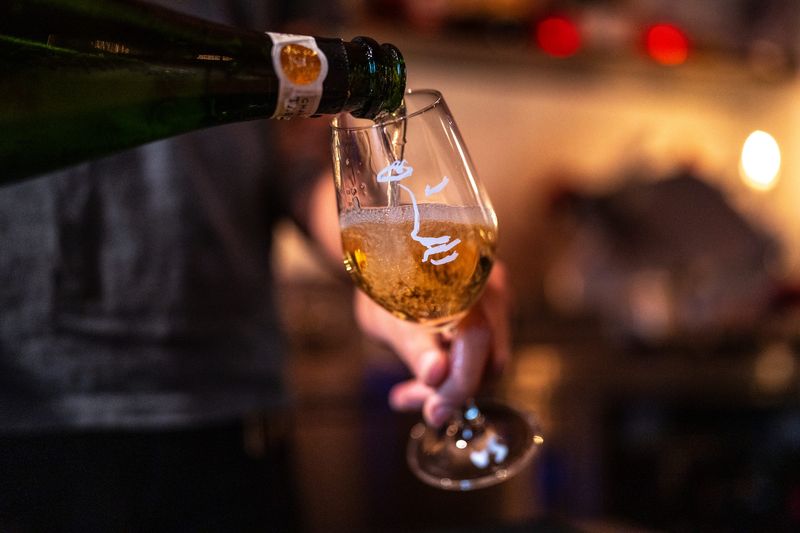 Chenin bar lead Varun Sharma pours a drink during the Detroit Free Press/Chevy Detroit Top 10 Takeover dinner series at Chenin, a small wine bar at the ground level of the Siren in downtown Detroit on Tuesday, May 26, 2026.