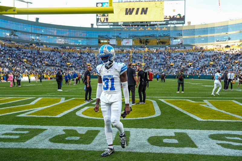 Detroit Lions safety Kerby Joseph walks off the field after the 27-13 loss to the Green Bay Packers at Lambeau Field in Green Bay, Wis., on Sunday, Sept. 7, 2025.