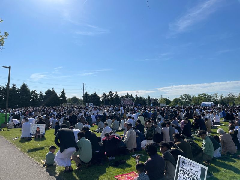 Thousands gather for Eid al-Adha prayers outside the city of Dearborn's civic center, the Ford Community & Performing Arts Center, on May 27, 2026.