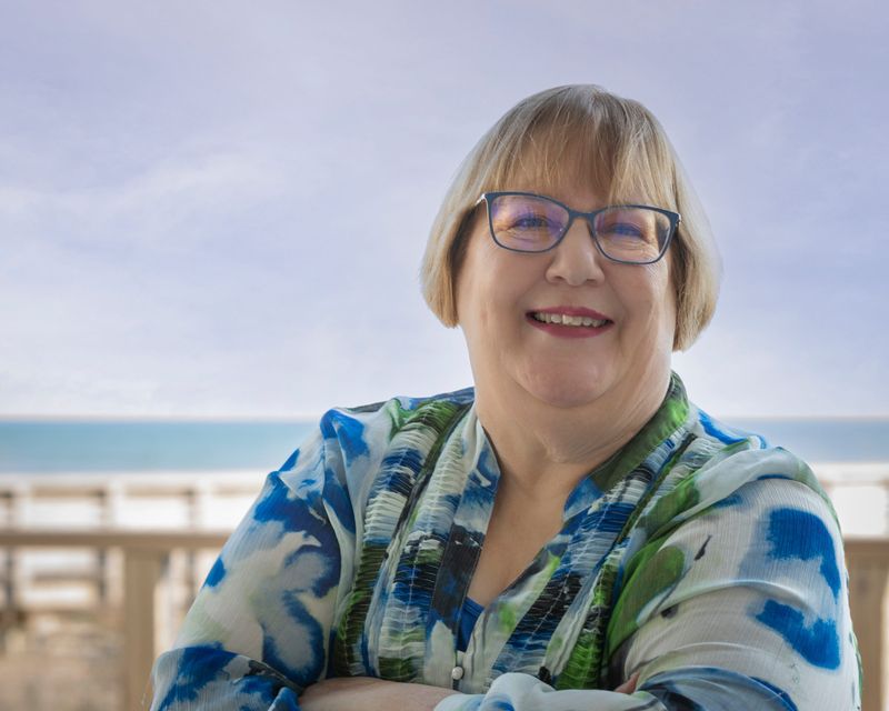 Amy Piper, of Holt, took up travel writing a decade ago. Her new book, “Small Town Michigan,” is her third.