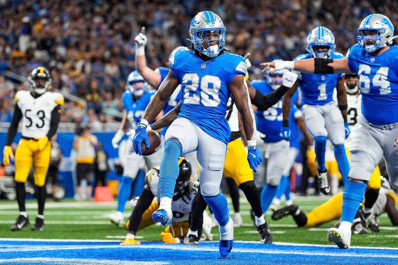 Detroit Lions running back Jermar Jefferson (28) runs for a touchdown against Pittsburgh Steelers during the second half of a preseason game at Ford Field in Detroit on Saturday, August 24, 2024.