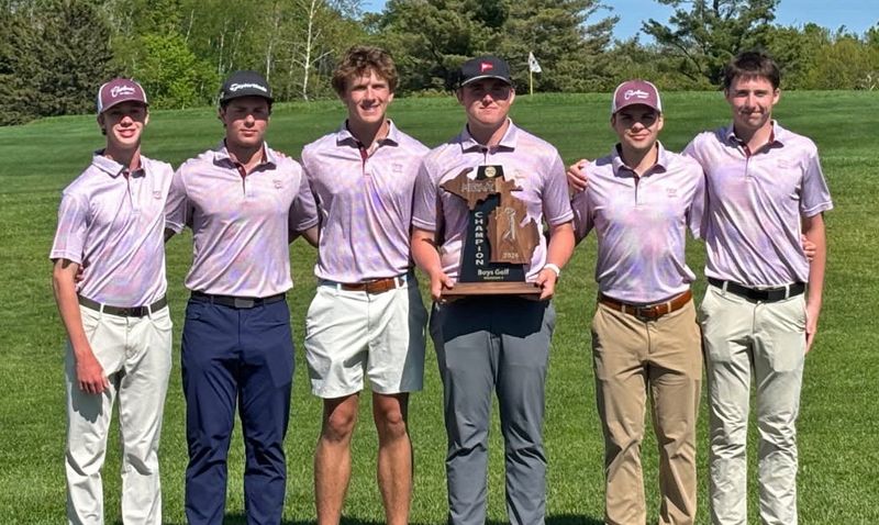 The Charlevoix boys golf team of (from left) Maxwell Drenth, Landen Whisler, Keane Helstrom, Bryce Boss, Joe Gaffney and Blake Boss stand with the regional championship trophy on Thursday, May 28 at Birchwood in Harbor Springs.