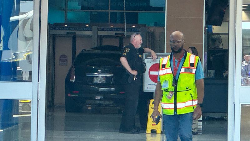 A black SUV is seen inside the Evans Terminal after driving into the terminal at Detroit Metro Airport on Friday, May 29, 2026.