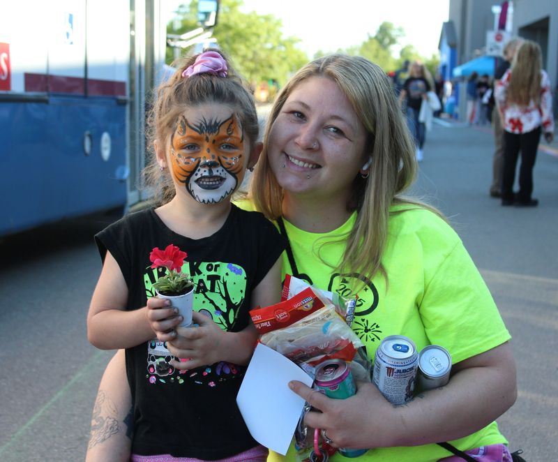 At the reopening of Monroe's Walmart Supercenter on May 29, 2026, Cecilia Boslet of Monroe and her four-year-old daughter Raniah McEntyre took part in the celebration.