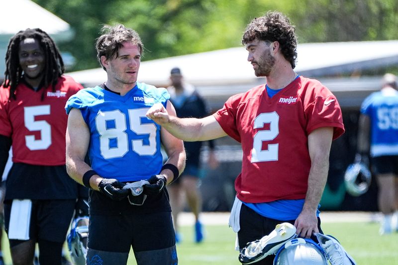 Detroit Lions wide receiver Tom Kennedy (85), left, talks to quarterback Luke Altmyer (2) after practice during OTAs at Meijer Performance Center in Allen Park on Friday, May 29, 2026.