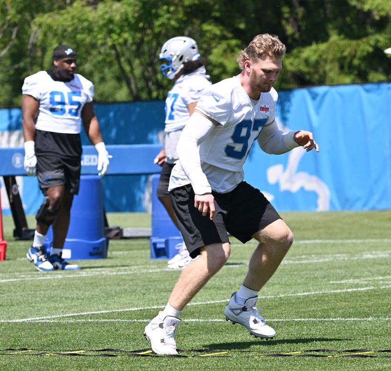 Lions defensive end Aidan Hutchinson works through a drill during an OTA last week in Allen Park.