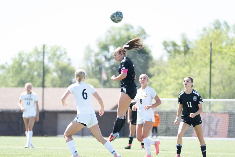 Lakeview senior Lilamae Frank heads the ball during a district final against Portage Central at Portage Northern High School on Saturday, May 30, 2026.