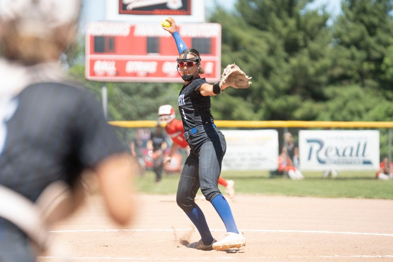 Harper Creek's Aleena Stahlhood pitches during a district final against Vicksburg at Marshall High School on Saturday, May 30, 2026.