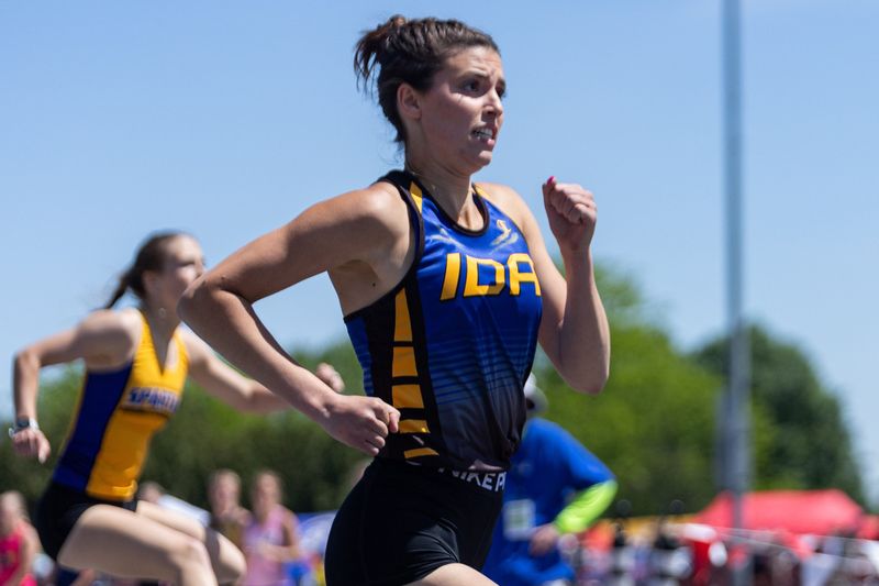 Ida's Julia Hughes competes in the 300 meter hurdles during the state championship on Saturday, May 30.