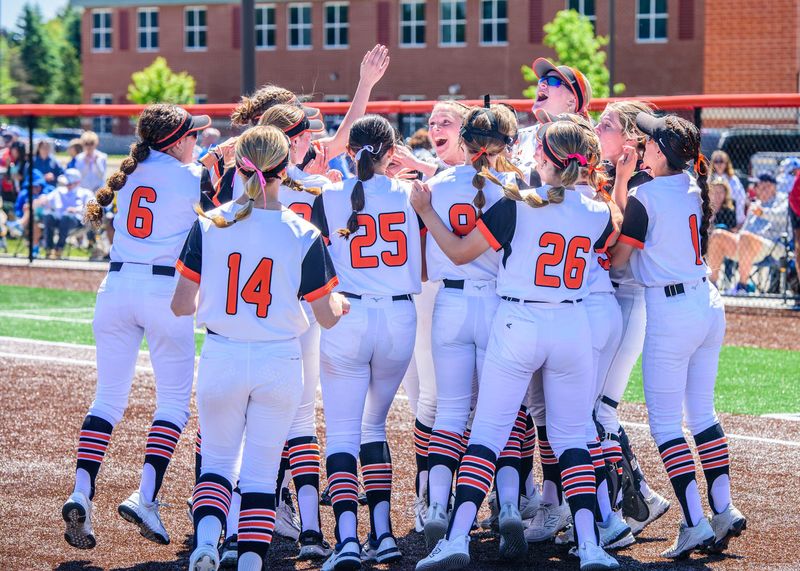 Northville celebrates winning the Division 1 softball district semifinal on Saturday, May 30, 2026, at Northville High School.