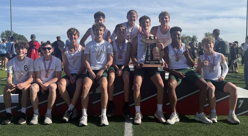 St. Mary Catholic Central's boys track and field team poses with the trophy after winning the Division 3 state championship on Saturday, May 30, 2026.