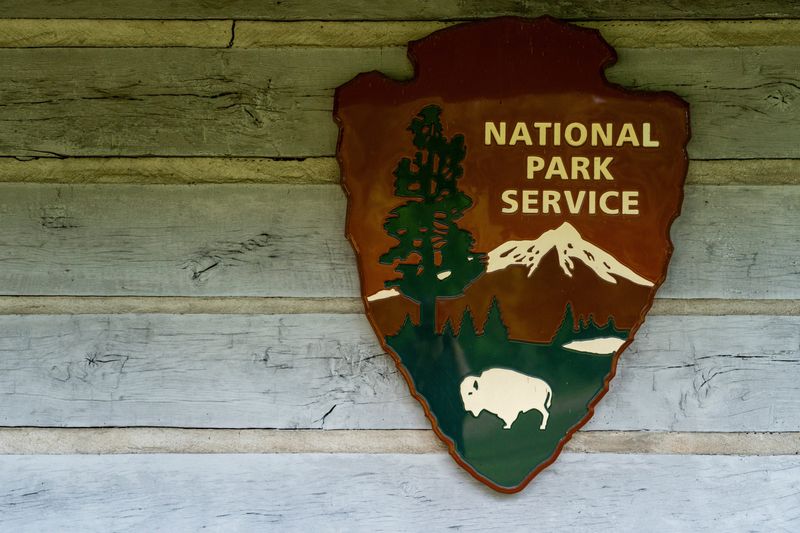 The National Park Service logo is seen on the Parkway Information Cabin near Natchez Trace Parkway in Ridgeland, Miss., on Wednesday, April 15, 2026.