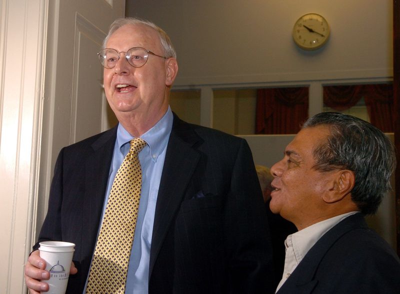 New U.S. Rep. Joe Schwarz talks with long-time friend Pedro Sevidal of Coldwater, MI, in his office before being sworn in on his first day in office, on Jan. 20, 2005.
