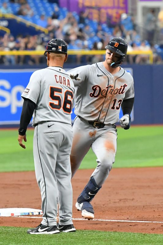 Detroit Tigers catcher Dillon Dingler (13) celebrates a home run with third base coach Joey Cora (56) during the third inning against Tampa Bay Rays at Tropicana Field in St. Petersburg, Florida, on Monday, June 1, 2026.