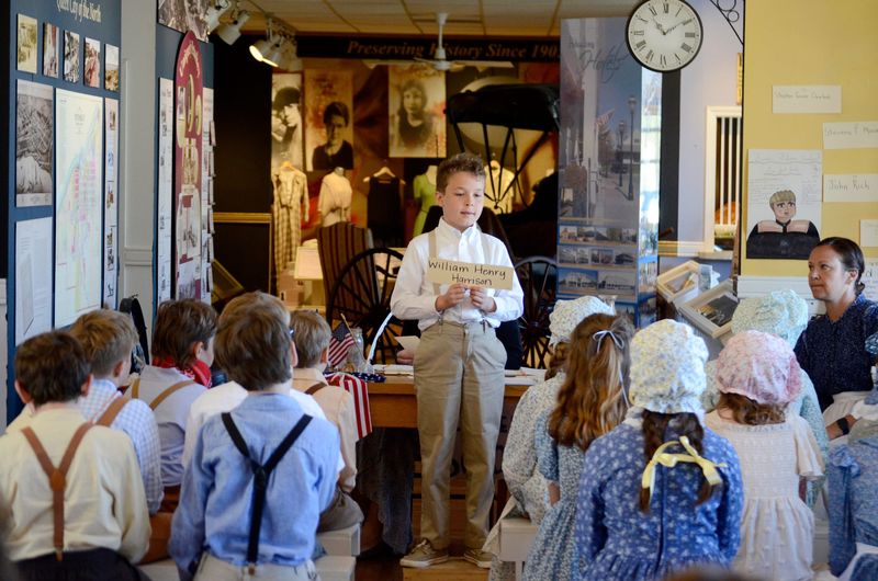 William Flynn delivers his recitation during St. Francis Xavier's one room schoolhouse day on June 2, 2026 at the Little Traverse History Museum in Petoskey.