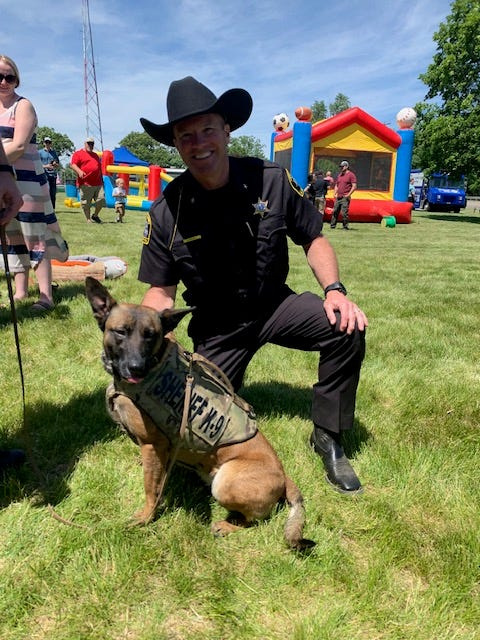 St. Joseph County Sheriff Chad Spence and Van Buren County's K-9, Charlie.