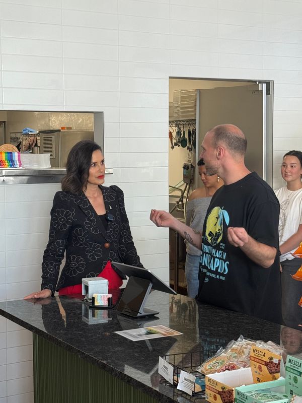 Michigan Gov. Gretchen Whitmer speaks to staff at Good Judy's Market and Juice Bar on Tuesday, June 2, 2026, in Grand Rapids, Mich. Whitmer said Michigan is well equipped to handle data center expansion due to standards set by state law.