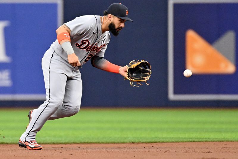 Detroit Tigers second baseman Gleyber Torres (25) fields a ground ball in the first inning against the Tampa Bay Rays at Tropicana Field in St. Petersburg, Florida, on Tuesday, June 2, 2026.