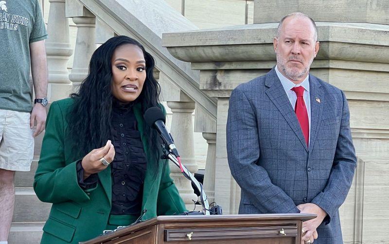 Michigan State University Trustee Rema Vassar speaks at a press conference outside the Michigan Capitol on Wednesday, June 3, 2026, with Trustee Mike Balow at her left.