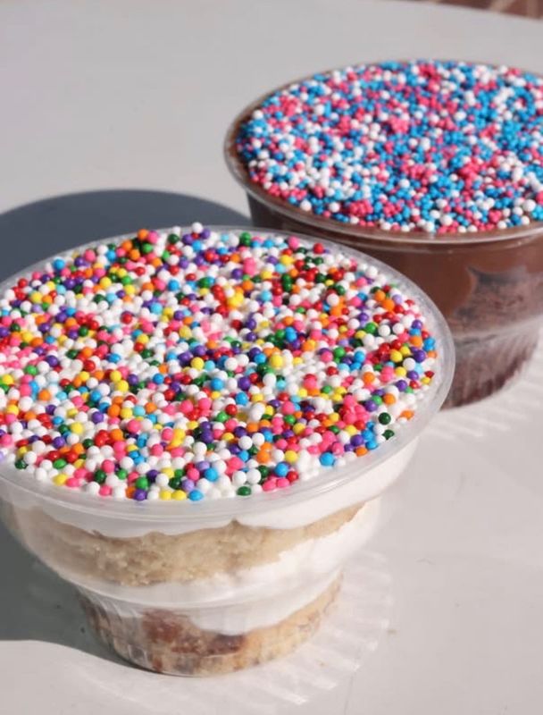 Dot cake like this has gone viral on social media because people like the thick layer of colorful sprinkles on top.