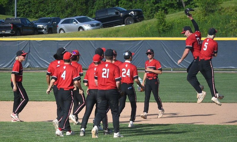 Monroe celebrates a 5-0 victory over Livonia Franklin in a Division 1 Regional semifinal game on Wednesday, June 3, 2026.