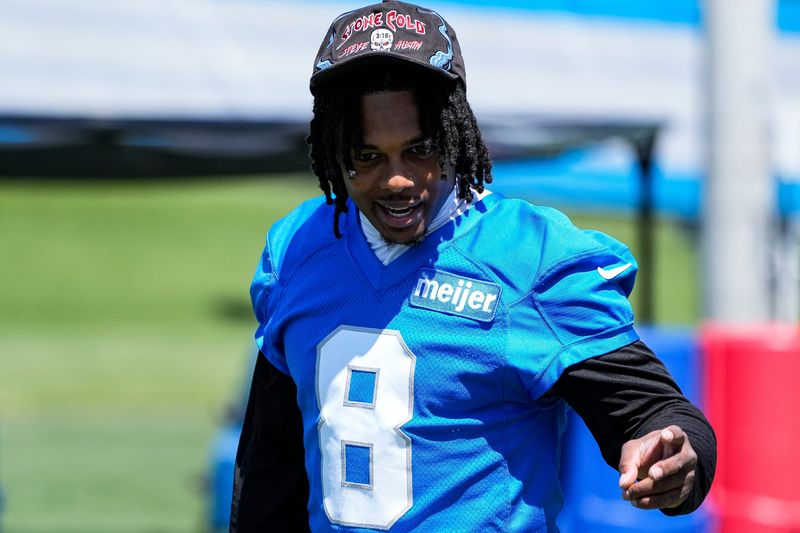 Detroit Lions wide receiver Greg Dortch (8) walks onto the field during OTAs at Meijer Performance Center in Allen Park on Friday, May 29, 2026.