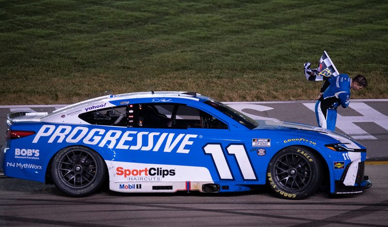 Denny Hamlin bows in homage to the late Kyle Busch after winning the NASCAR Cup Series Cracker Barrel 400 at the Nashville Superspeedway on Sunday, May 31, 2026.