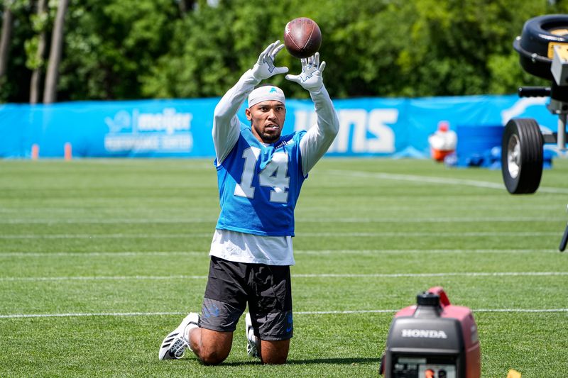 Detroit Lions wide receiver Amon-Ra St. Brown (14) warms up during OTAs at Meijer Performance Center in Allen Park on Thursday, June 4, 2026.