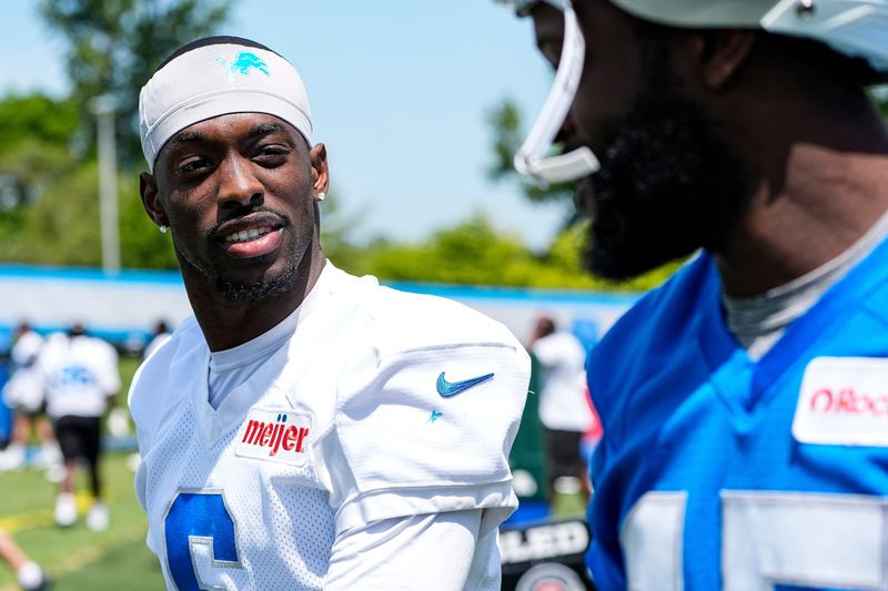 Detroit Lions cornerback Terrion Arnold (6), left, talks to wide receiver Malik Cunningham (15) during OTAs at Meijer Performance Center in Allen Park on Thursday, June 4, 2026.