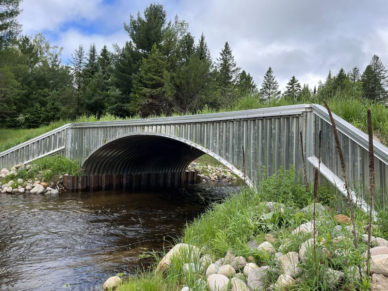 The Michigan Department of Natural Resources is planning to remove the nearly 80-year-old Roberts Lake Dam in Cheboygan County this summer. The project also includes installing a new bottomless box culvert that is similar in design to the culvert installed at the former site of the Timberland Ranch Dam on the West Branch Tittabawassee River in Roscommon County.