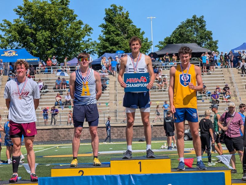 Dawson Scharer runs down another state hurdles title.