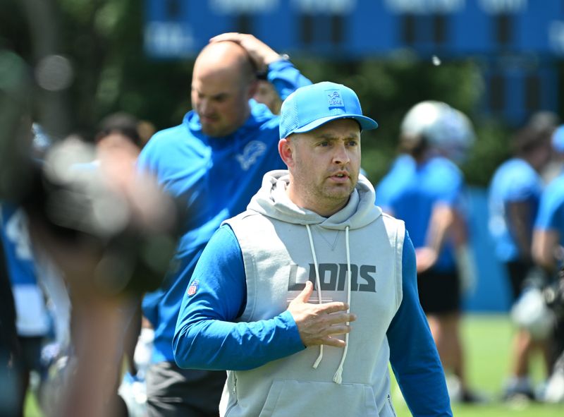 New offensive coordinator Drew Petzing walks off the field after a Detroit Lions OTA session at the training facility in Allen Park on June 4, 2026.