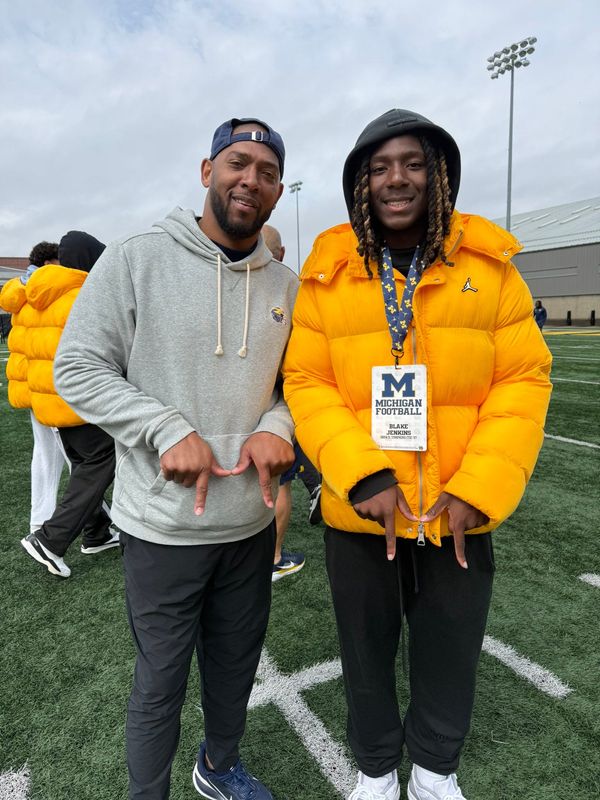 Four-star cornerback Blake Jenkins, right, is the 16th commit in Michigan's 2027 recruiting class.