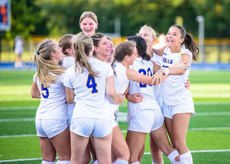 Bloomfield Hills Marian players celebrate during the Division 2 girls soccer regional final on Thursday, June 4, 2026, at Waterford Mott High School.
