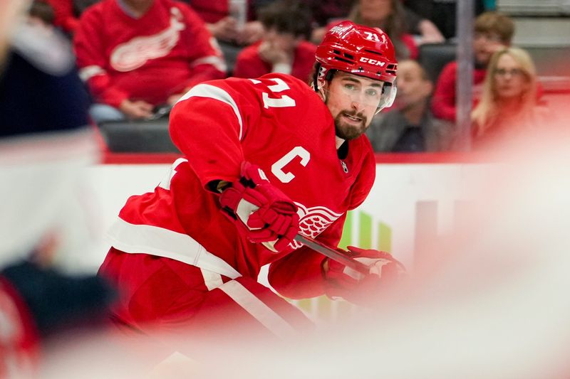 Detroit Red Wings center Dylan Larkin (71) skates down the ice during the first period against the Columbus Blue Jackets at Little Caesars Arena.