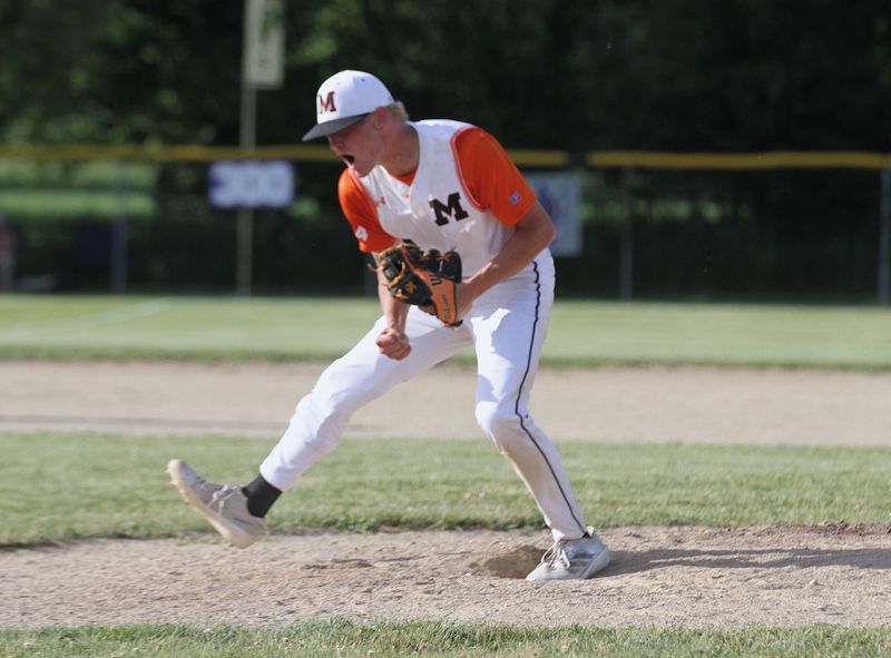 Abram Coffey of Marcellus celebrates after recording the final out in the regional semifinals on Wednesday.