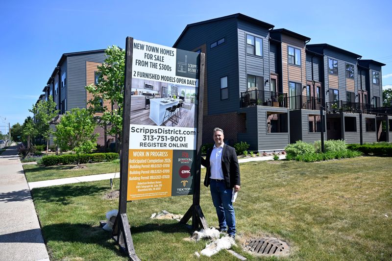 Robertson Homes President Darian Neubecker in front of some of the Scripps District townhomes in Detroit on Friday, June 5, 2026. New home construction across Metro Detroit has cooled year over year as high interest rates and construction costs weigh on affordability.