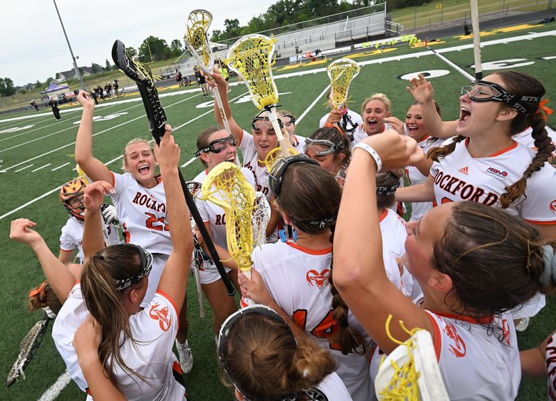 The Rockford Rams celebrate their final victory over South Lyon United, 16-9, in the girls division one lacrosse finals at Parker Middle School in Howell, Michigan on June 5, 2026.