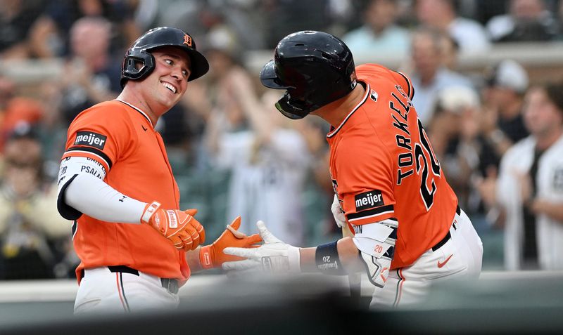 Tigers’ Kerry Carpenter, left, reacts with Spencer Torkelson after Carpenter’s two-run home run in the third inning. Detroit Tigers take on the Seattle Mariners on June 5, 2026 at Comerica Park in Detroit.