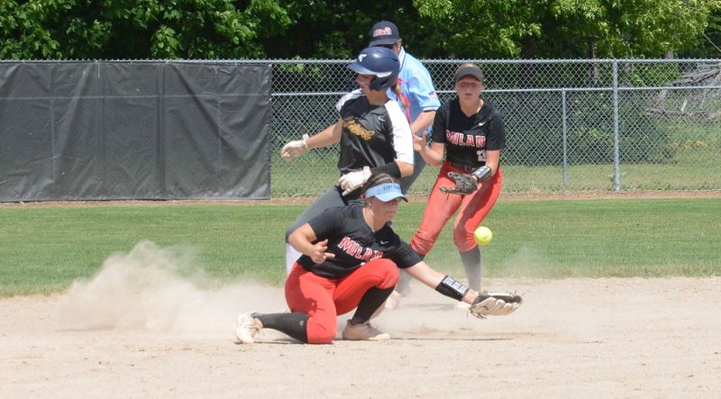 Emma Wehrs of Airport steals second base as the ball bounces in front of Milan shortstop Reese Knox during Airport's 11-4 victory in the finals of the Division 2 Regional at Fowlerville on Saturday, June 6, 2026.
