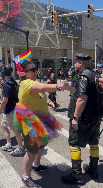 Stephanie Catalfio, of Warren, gave out hundreds of free "mom hugs" at the Motor City Pride Parade in Detroit on Sunday.