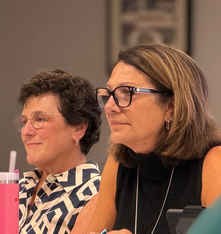 Amy Smith (left) and Deb Johnson (right) listen at a CSCB meeting on May 27, 2026, at the Salvation Army, 2000 Court St. in Port Huron. Smith serves as CSCB assistant division director and Johnson serves as chair of the collaborative.