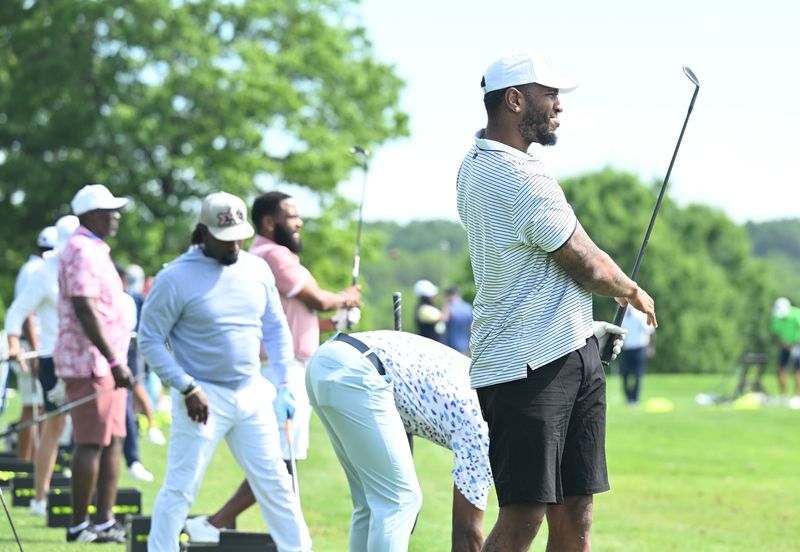 Former Detroit Lions tight end Eric Ebron works on the range at the annual Feldman Automotive Children's Miracle Celebrity Invitational at Wyndgate Country Club in Rochester, Michigan on June 8, 2026.